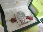 Rolex replica daydate ll acciaio green dial orologio replica copia imitazione 4us711 - immagine 3