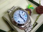 Rolex replica daydate ll acciaio cyan dial strip president orologio replica copia imitazione 4us - immagine 3