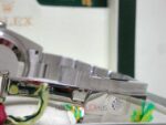Rolex replica oyster perpetual red grape acciaio imitazione copia - immagine 15